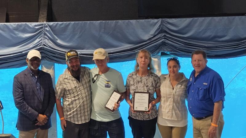 Volunteer receiving award.