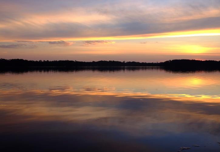 Sky pinks, yellows, and oranges over Rocky Bayou.